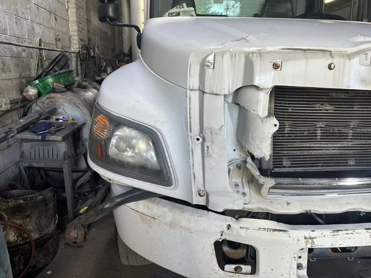 Hino Cab & Hood Repair — before