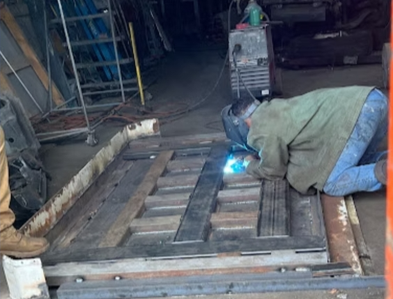 Liftgate welding and repair in shop
